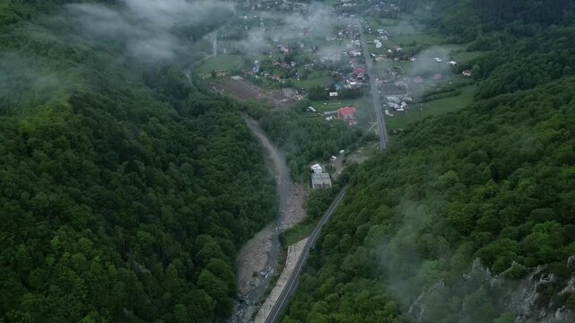 Aerial View Over Village Houses In The Valley On A Misty Day In Lepsa, Vrancea, Romania - Drone Shot