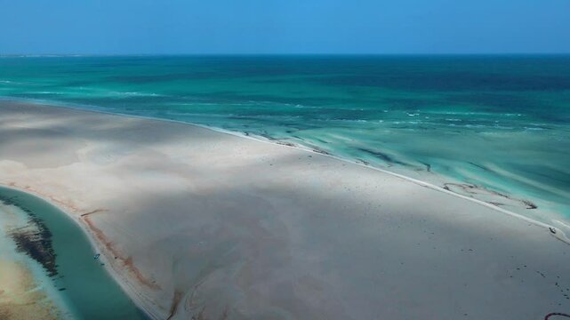 An aerial view of Hassi El Jerbi aquatic beach scene at Zarzis Tunisia and rivers surrounding it while camera panning