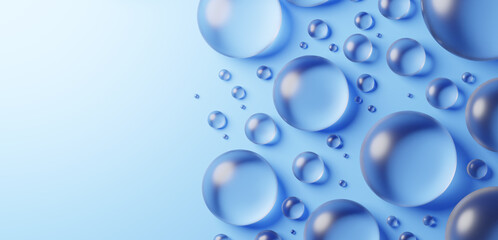 水色背景に複数の透明な丸いガラス。俯瞰。コピースペース。3D（横長）