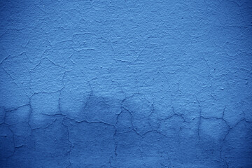 Blue background with texture and distressed vintage grunge and watercolor paint stains 