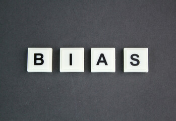 Letters of the alphabet with the word BIAS. inclination or prejudice for or against one person