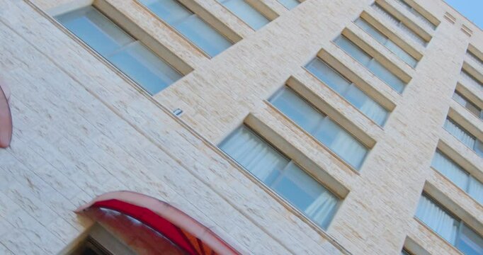 Panning shot of symmetric windows 2.7K