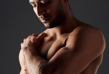 Fitness, shoulder or man in studio with thinking, close up or muscles on black background. Active...