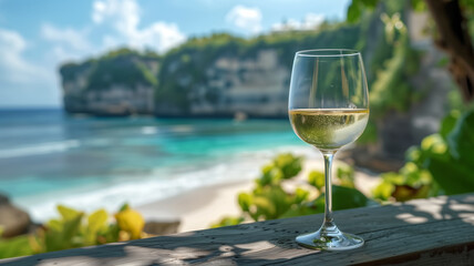 Obraz premium Summertime in Bali, Indonesia. Two glasses of cold wine on the sandy Nusa Penida beach, Bali, Indonesia, Summer vacation travel.