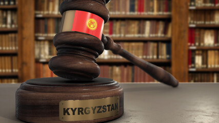 Kyrgyzstan Flag on Judge Gavel or Hammer in Court with Country Name. Legal System 3D Illustration