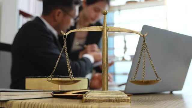 Lawyer business discussing with team about justice law at the lawyer's office