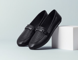 black leather loafers slip on shoes isolated