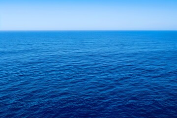 Obraz premium Minimalist Blue Ocean Surface, Calm Water, Wide Angle