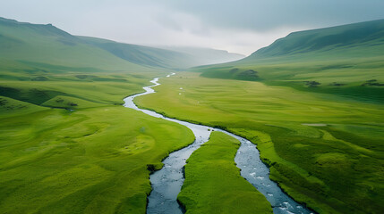 Aerial view of a green valley with a small river in Iceland highlands
