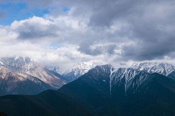 Fototapeta premium Beautiful snow capped mountain landscape in Sichuan, China