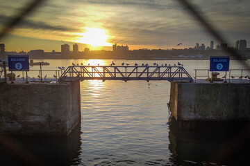 sunset over the port bridge