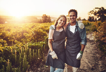Love, hug and farming as couple on countryside for agriculture, growth and wine. Teamwork, bonding...