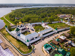 View of male Ipatiev Monastery on bank of river in Russian city of Kostroma on sunny spring day