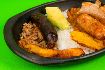 Paisa tray the most representative dish of Colombia and the emblem of Antioquia gastronomy