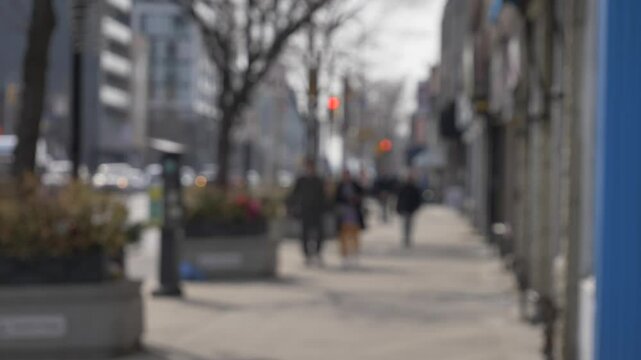 empty Toronto Danforth Village sidewalk ppl slow walking