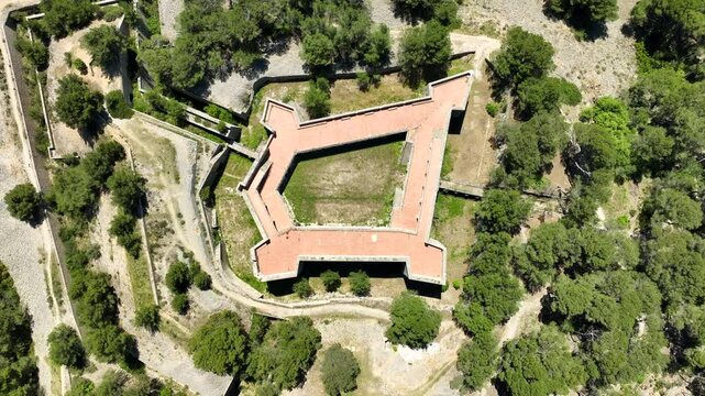 Aerial birdseye rising from Fort Faron on sunny day, Toulon, France