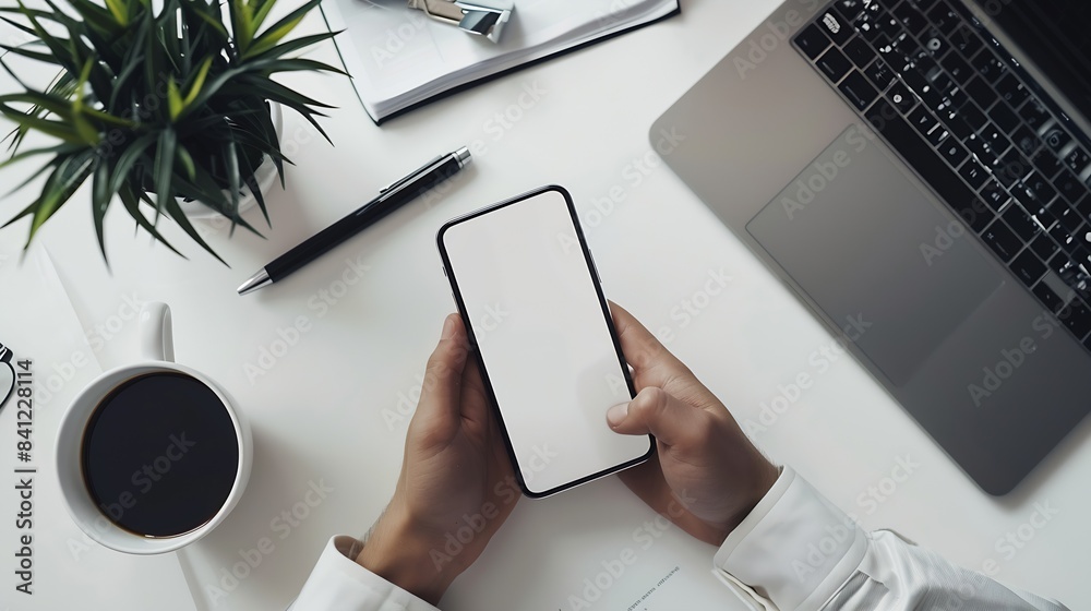 Aufkleber overhead shot businessman using his cellphone reading an informations or email on the phone screen a