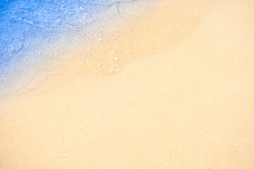 background for summer vacation concept. Nature of the beach and sea, summer with sunlight, sandy beach The sparkling sea water	