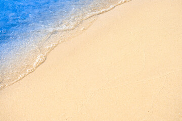 View of background for summer vacation concept. Nature of the beach and sea, summer with sunlight, sandy beach The sparkling sea water	