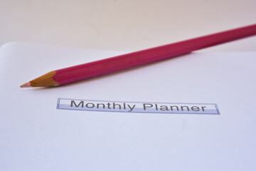 Color pencil on monthly planner cover sheet. Macro photo shot, shallow depth of field, selective focus