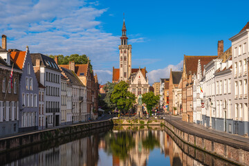 Fototapeta premium Scenery of Spiegelrei, a watercourse and street in the center of Bruges, Belgium.