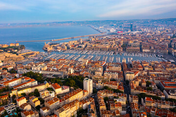 Scenic aerial view of coastal area of Marseille overlooking Old Port with moored yachts on...