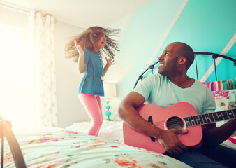 Child, father and guitar in bedroom at home for playing, having fun or bonding together with...