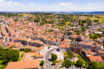 Flight over the city Craponne-sur-Arzon on summer day. France