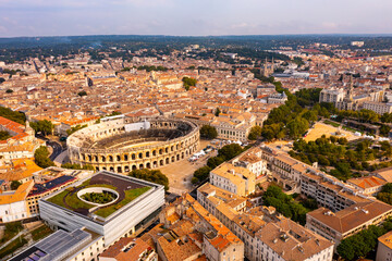 Obraz premium Nimes Arena aerial panoramic view. Nimes is a city in the Occitanie region of southern France