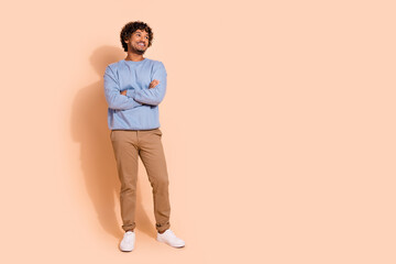 Full size photo of dreamy guy dressed blue pullover trousers palms folded look at discount empty...