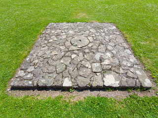 Fountain base at the courtyard of Raglan Castle (Wales, United Kingdom)