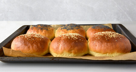 Meny buns with sesame seeds