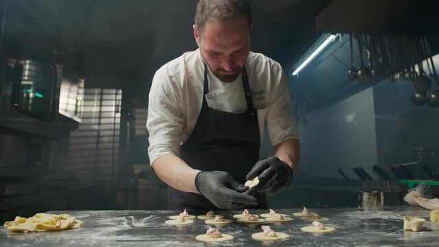 Chef's Ability At Work While Making Cappelletti Pasta 