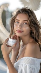 Beautiful smiling young woman with clean skin holding facial essential oil or serum with dropper, rejuvenation and skin care, white background