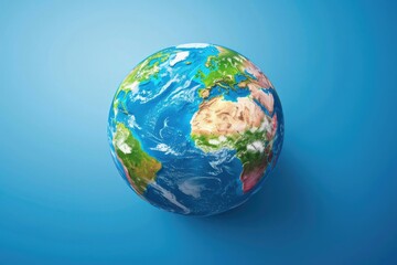 Fototapeta premium A close-up of the Earth's surface on a calm blue background, suitable for use in educational or corporate presentations