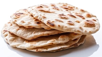 A single serving of flatbread sits on a white plate, ready to be served or used in a food presentation