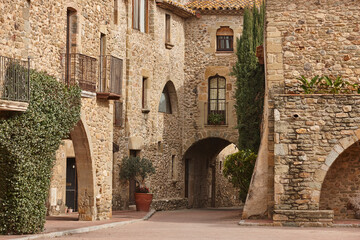 Arcades. Medieval village of Monells. Girona, Costa Brava. Catalunya. Spain