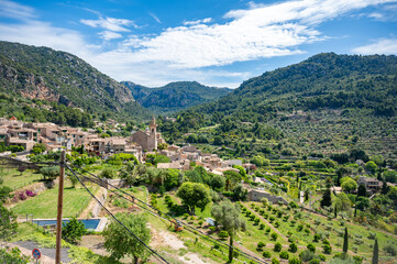 Cityscape of Valldemossa village with cathedral, Majorca during daylight, wide angle shot, Mallorca