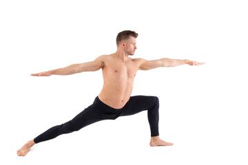 Fototapeta premium Fitness and Yoga. Healthy lifestyle. Young attractive man posing in the studio. White background.