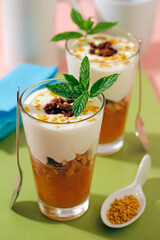 Yogurt with walnuts and pollen.
