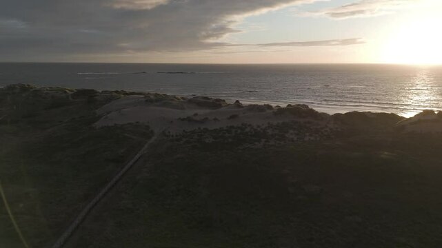Sunset view over Ofir Beach in Esposende, Portugal, showcasing coastal dunes and the serene ocean.