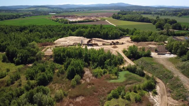 A Comprehensive Sight of the Old Sand Quarry Near the Town of Prudnik, Poland - Aerial Drone Shot