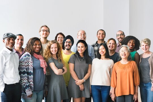A team of diverse people doing a group photo