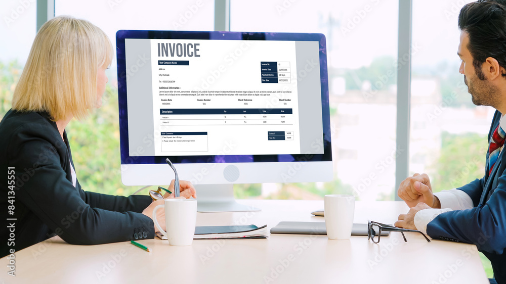 Poster invoice on computer screen from accounting application. computer program for financial and budget of