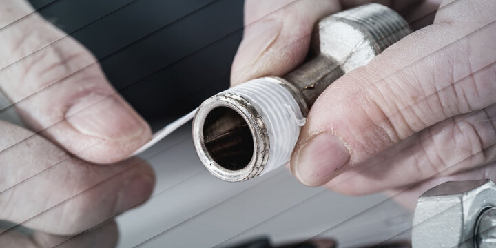 Plumber putting a teflon joint on a thread, geometric pattern
