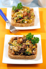 Scrambled eggs with mushroom and spring garlic.