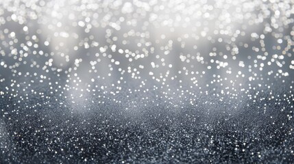 Stormy gradient from dark gray to light gray with sparkling silver glitter like rain wallpaper. 