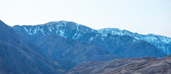 Autumn landscape in China. Breathtaking, amazing, endless desert mountain landscapes bordering the...