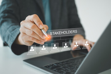 Stakeholders concept. Person touching stakeholders icon on virtual screen for business finance stakeholder investment management. Different stakeholders contact collaboration for company organization