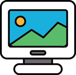 A computer monitor with a picture of mountains on it